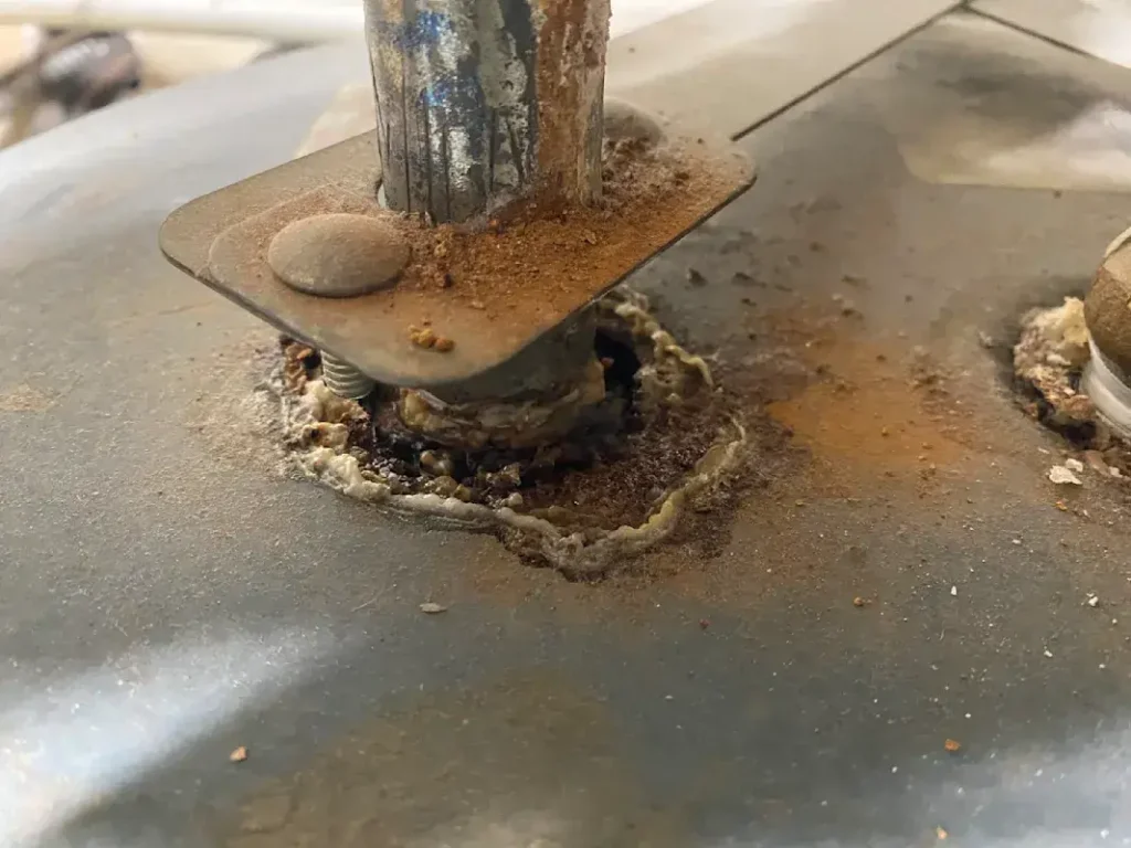 Expert plumber from PBT – Plumbing by Tony performing drain cleaning services with advanced tools and techniques.